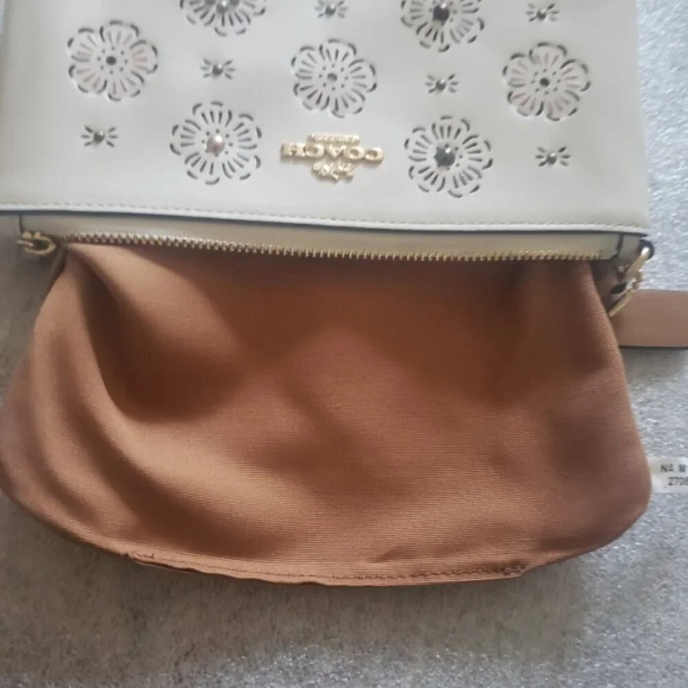 Coach White Leather Wristlet with Cut Out Tea Rose